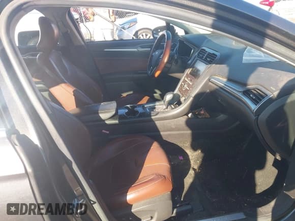 ✅ 2016 Ford Fusion Titanium • VIN: 3FA6P0K96GR140023 • Lot: 43714831. Listed on IAAI with 144,663 mi. Free auction sales archive from the USA and detailed vehicle history report at DreamBid. Image 5.