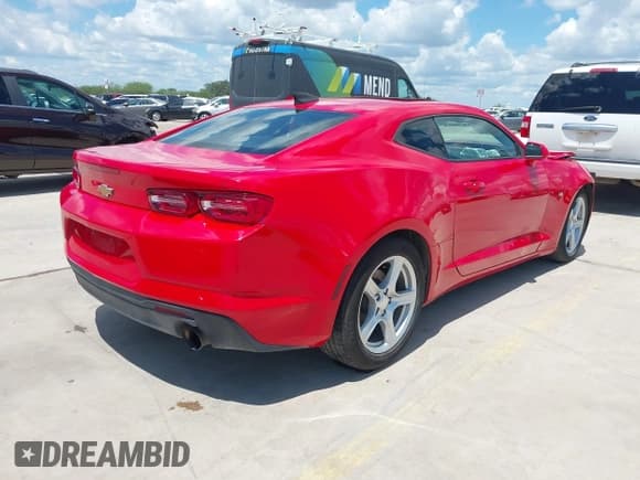 ✅ 2022 Chevrolet Camaro 1LT • VIN: 1G1FB1RX9N0112791 • Lot: 42204932. Listed on IAAI with 69,679 mi. Free auction sales archive from the USA and detailed vehicle history report at DreamBid. Image 4.