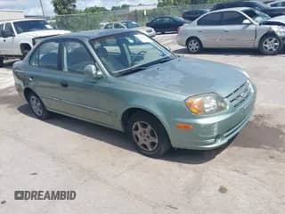 2004 Hyundai Accent GL with VIN KMHCG45C54U540120, listed as a IAAI auction lot 42469965 with 114,639 mi miles and . Bid and sale history available at DreamBid. Image 1.