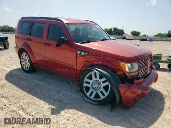 2008 Dodge Nitro R/T with VIN 1D8GT58628W127399, listed as a Copart auction lot 61335475 with 106,255 mi miles and Salvage title. Bid and sale history available at DreamBid. Image 4.
