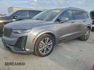 ✅ 2020 Cadillac XT6 FWD Premium Luxury • VIN: 1GYKPCRS7LZ174054 • Lot: 93386665. Listed on Copart with 166,310 mi. Free auction sales archive from the USA and detailed vehicle history report at DreamBid. Image 1.