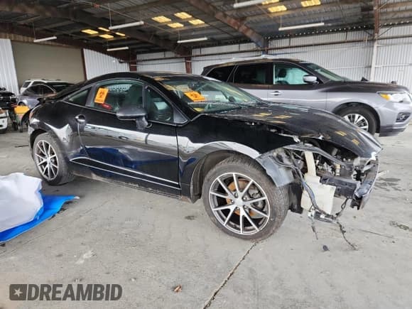 ✅ 2012 Mitsubishi Eclipse GS • VIN: 4A31K5DF9CE004272 • Lot: 87291365. Listed on Copart with Not provided. Free auction sales archive from the USA and detailed vehicle history report at DreamBid. Image 4.