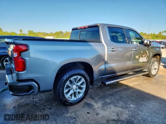 2020 Chevrolet Silverado 1500 High Country z VIN 1GCUYHEL5LZ183780, wystawiony jako Copart lot #91276325 z przebiegiem Nie podano mil oraz Szkoda całkowita • Salvage title. Historia ofert i sprzedaży dostępna na DreamBid. Obrazek 3.