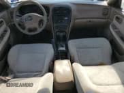 ✅ 2005 Kia Optima LX • VIN: KNAGD126355382493 • Lot: 75190704. Listed on Copart with 116,017 mi. Free auction sales archive from the USA and detailed vehicle history report at DreamBid. Image 8.