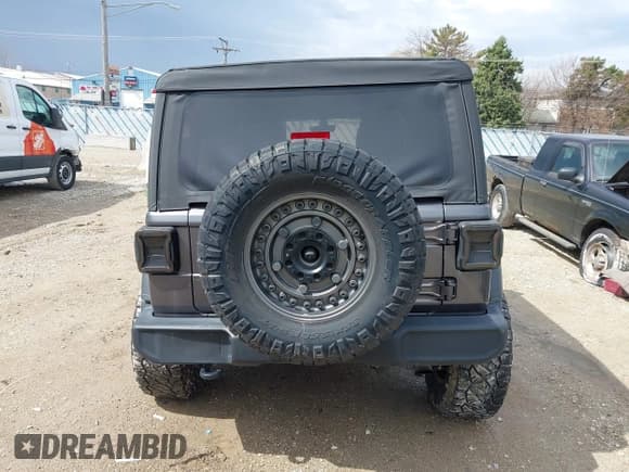 ✅ 2022 Jeep Wrangler Unlimited Sport S • VIN: 1C4HJXDG6NW180234 • Lot: 41908743. Listed on IAAI with 50,704 mi. Free auction sales archive from the USA and detailed vehicle history report at DreamBid. Image 17.