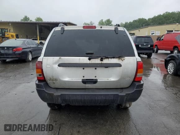 ✅ 2004 Jeep Grand Cherokee Laredo • VIN: 1J4GW48S74C288625 • Lot: 61290805. Listed on Copart with 194,615 mi. Free auction sales archive from the USA and detailed vehicle history report at DreamBid. Image 6.