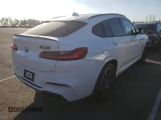✅ 2021 BMW X4 M • VIN: 5YMUJ0C01M9F44884 • Lot: 66311342. Wystawiony na Copart z przebiegiem 13 901 mil. Bezpłatny archiwum sprzedaży aukcyjnych z USA i szczegółowy raport historii pojazdu na DreamBid. Zdjęcie 4.