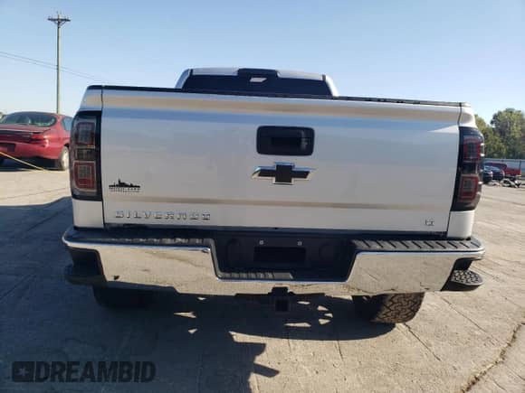 2017 Chevrolet Silverado 1500 LT с VIN 3GCUKREC0HG109911, выставлен на аукционе Copart как лот 69983525 с пробегом 152 813 миль миль и Списание • Salvage title. История ставок и продаж доступна на DreamBid. Изображение 6.