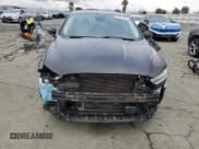 ✅ 2013 Ford Fusion Titanium Hybrid • VIN: 3FA6P0RU2DR282147 • Lot: 82401535. Wystawiony na Copart z przebiegiem 88 760 mil. Bezpłatny archiwum sprzedaży aukcyjnych z USA i szczegółowy raport historii pojazdu na DreamBid. Zdjęcie 5.