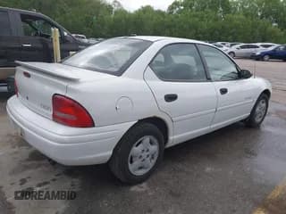 ✅ 1999 Dodge Neon • VIN: 1B3ES47Y6XD157331 • Lot: 42153698. Listed on IAAI with 218,408 mi. Free auction sales archive from the USA and detailed vehicle history report at DreamBid. Image 4.