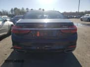 ✅ 2017 BMW 7 Series 740i xDrive • VIN: WBA7E4C58HGU99127 • Lot: 70320002. Listed on Copart with 62,489 mi. Free auction sales archive from the USA and detailed vehicle history report at DreamBid. Image 6.