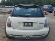 ✅ 2004 MINI Hardtop S • VIN: WMWRE33434TD81033 • Lot: 63759035. Listed on Copart with 319,648 mi. Free auction sales archive from the USA and detailed vehicle history report at DreamBid. Image 6.