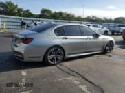 ✅ 2022 BMW 7 Series 740i xDrive • VIN: WBA7T4C03NCK85529 • Лот: 52188325. Опубликован ранее на Copart с пробегом 28 427 миль. Бесплатный доступ к архиву аукционных продаж из США и подробный отчёт об истории автомобиля на DreamBid. Изображение 3.