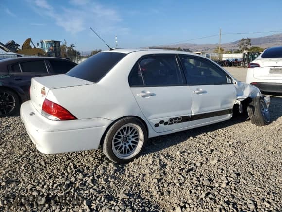 ✅ 2003 Mitsubishi Lancer ES • VIN: JA3AJ26E63U000905 • Lot: 82714615. Wystawiony na Copart z przebiegiem 116 760 mil. Bezpłatny archiwum sprzedaży aukcyjnych z USA i szczegółowy raport historii pojazdu na DreamBid. Zdjęcie 3.