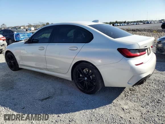 2021 BMW 3 Series 330i xDrive with VIN 3MW5R7J04M8B61639, listed as a Copart auction lot 90417205 with 40,879 mi miles and Salvage title. Bid and sale history available at DreamBid. Image 2.