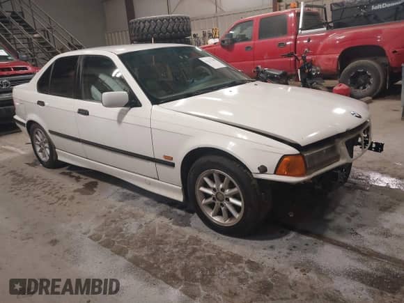 1998 BMW 3 Series 328i with VIN WBACD4323WAV62223, listed as a IAAI auction lot 42217700 with 197,482 mi miles and . Bid and sale history available at DreamBid. Image 1.