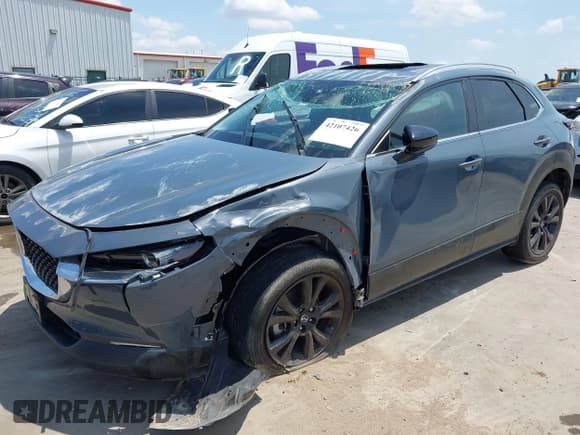 ✅ 2022 Mazda CX-30 S Carbon Edition • VIN: 3MVDMBCL6NM410330 • Lot: 42107426. Listed on IAAI with 30,277 mi. Free auction sales archive from the USA and detailed vehicle history report at DreamBid. Image 18.