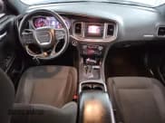 ✅ 2015 Dodge Charger SE • VIN: 2C3CDXBG4FH928648 • Lot: 84612195. Wystawiony na Copart z przebiegiem 149 311 mil. Bezpłatny archiwum sprzedaży aukcyjnych z USA i szczegółowy raport historii pojazdu na DreamBid. Zdjęcie 8.