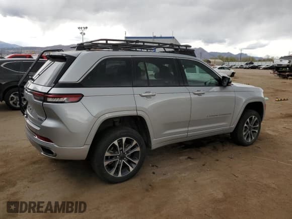 ✅ 2022 Jeep Grand Cherokee Overland • VIN: 1C4RJYD69N8739894 • Lot: 52593274. Listed on Copart with 25,309 mi. Free auction sales archive from the USA and detailed vehicle history report at DreamBid. Image 3.
