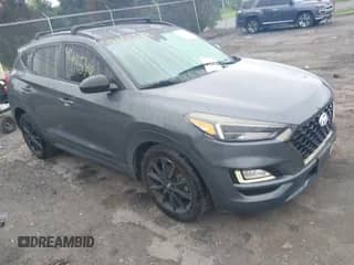 2019 Hyundai Tucson SEL z VIN KM8J33AL3KU965500, wystawiony jako IAAI lot #42611549 z przebiegiem 104 688 mil mil oraz . Historia ofert i sprzedaży dostępna na DreamBid. Obrazek 1.