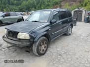 ✅ 2003 Suzuki XL7 Touring • VIN: JS3TX92V534108165 • Lot: 69974505. Listed on Copart with 216,379 mi. Free auction sales archive from the USA and detailed vehicle history report at DreamBid. Image 1.