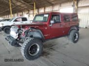 ✅ 2012 Jeep Wrangler Unlimited Rubicon • VIN: 1C4HJWFGXCL165273 • Lot: 68197715. Listed on Copart with 155,906 mi. Free auction sales archive from the USA and detailed vehicle history report at DreamBid. Image 1.