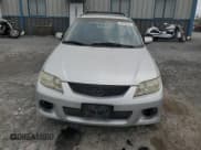 ✅ 2003 Mazda Protege • VIN: JM1BJ245131200147 • Lot: 62848564. Listed on Copart with 141,556 mi. Free auction sales archive from the USA and detailed vehicle history report at DreamBid. Image 5.