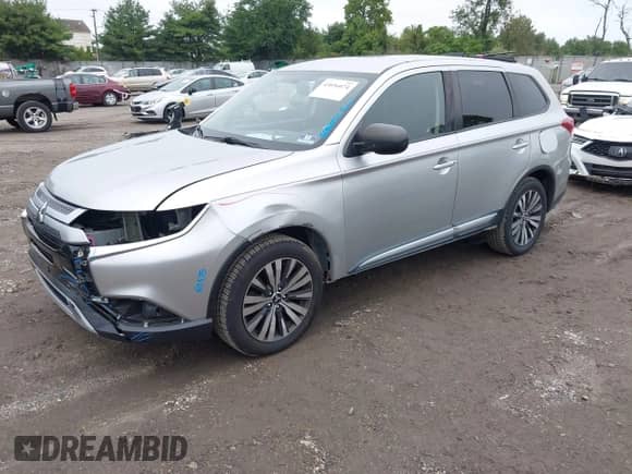 2019 Mitsubishi Outlander ES z VIN JA4AD2A3XKZ053441, wystawiony jako IAAI lot #43036074 z przebiegiem 105 182 mil mil oraz . Historia ofert i sprzedaży dostępna na DreamBid. Obrazek 19.