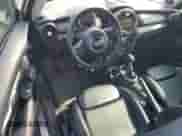 2014 MINI Hardtop S with VIN WMWXM7C59ET987820, listed as a Copart auction lot 59164955 with 77,699 mi miles and Salvage title. Bid and sale history available at DreamBid. Image 8.