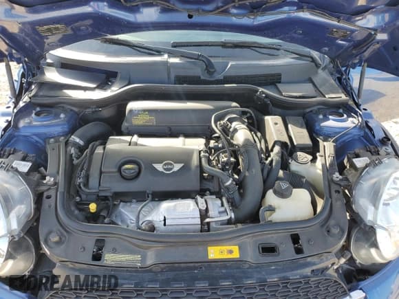 ✅ 2014 MINI Roadster S • VIN: WMWSY3C5XET595324 • Lot: 42704705. Wystawiony na Copart z przebiegiem 102 787 mil. Bezpłatny archiwum sprzedaży aukcyjnych z USA i szczegółowy raport historii pojazdu na DreamBid. Zdjęcie 12.