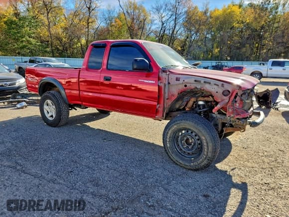 ✅ 2002 Toyota Tacoma PreRunner • VIN: 5TESN92N92Z897457 • Lot: 95911885. Listed on Copart with 170,314 mi. Free auction sales archive from the USA and detailed vehicle history report at DreamBid. Image 4.