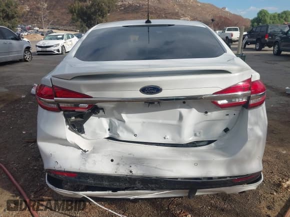 ✅ 2017 Ford Fusion Titanium • VIN: 3FA6P0SU6HR329342 • Lot: 43442656. Listed on IAAI with 179,589 mi. Free auction sales archive from the USA and detailed vehicle history report at DreamBid. Image 17.