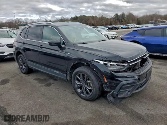 ✅ 2022 Volkswagen Tiguan SE • VIN: 3VV2B7AX2NM133663 • Лот: 95056935. Опубликован ранее на Copart с пробегом 97 393 миль. Бесплатный доступ к архиву аукционных продаж из США и подробный отчёт об истории автомобиля на DreamBid. Изображение 4.