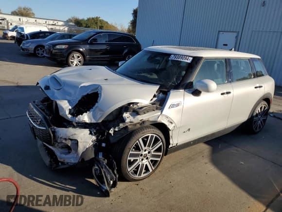 ✅ 2022 MINI Clubman Cooper S • VIN: WMWXJ1C06N2P82102 • Lot: 79389094. Listed on Copart with 6,401 mi. Free auction sales archive from the USA and detailed vehicle history report at DreamBid. Image 1.