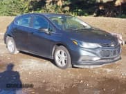 ✅ 2018 Chevrolet Cruze LT • VIN: 3G1BE6SM7JS645177 • Lot: 43475388. Listed on IAAI with 107,539 mi. Free auction sales archive from the USA and detailed vehicle history report at DreamBid. Image 1.