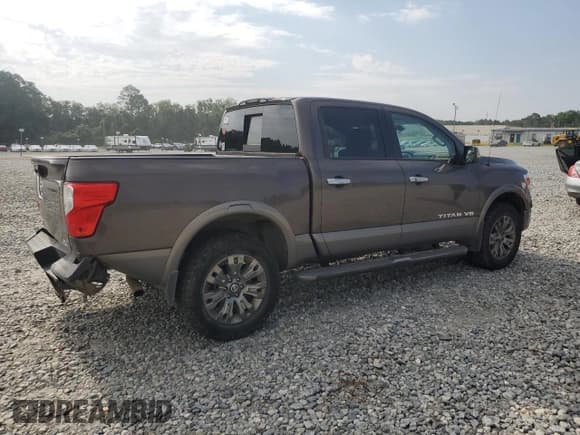 ✅ 2018 Nissan Titan SL • VIN: 1N6AA1E57JN509161 • Лот: 63402265. Опубликован ранее на Copart с пробегом 86 515 миль. Бесплатный доступ к архиву аукционных продаж из США и подробный отчёт об истории автомобиля на DreamBid. Изображение 3.