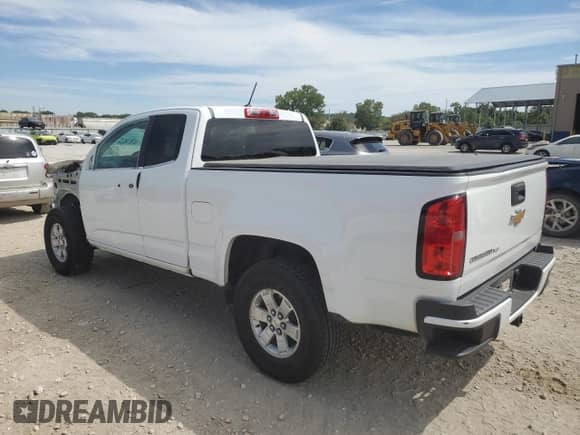 2019 Chevrolet Colorado 2WD Work Truck with VIN 1GCHSBEN7K1152092, listed as a Copart auction lot 71048095 with 76,279 mi miles and Salvage title. Bid and sale history available at DreamBid. Image 2.