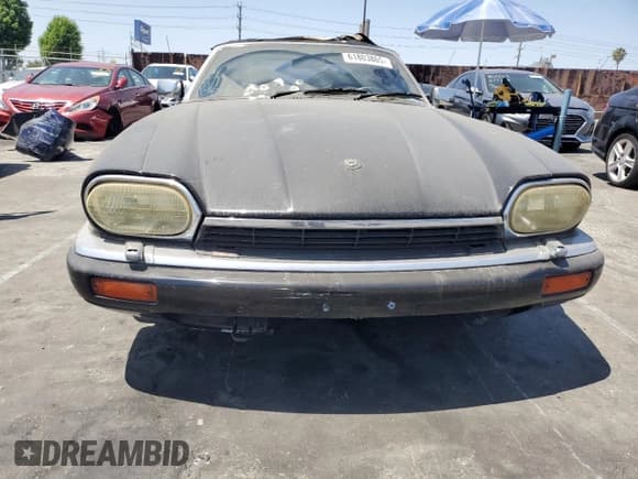✅ 1994 Jaguar XJS • VIN: SAJNX4748RC188121 • Lot: 61803865. Wystawiony na Copart z przebiegiem 137 102 mil. Bezpłatny archiwum sprzedaży aukcyjnych z USA i szczegółowy raport historii pojazdu na DreamBid. Zdjęcie 5.