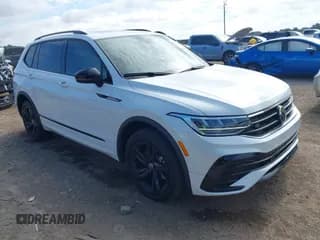 ✅ 2023 Volkswagen Tiguan SE R-Line Black • VIN: 3VVCB7AXXPM004545 • Lot: 42603638. Wystawiony na IAAI z przebiegiem 36 734 mil. Bezpłatny archiwum sprzedaży aukcyjnych z USA i szczegółowy raport historii pojazdu na DreamBid. Zdjęcie 1.