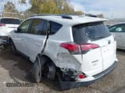 ✅ 2018 Toyota RAV4 XLE • VIN: JTMWFREVXJJ168015 • Lot: 43547840. Listed on IAAI with 104,838 mi. Free auction sales archive from the USA and detailed vehicle history report at DreamBid. Image 6.