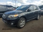 ✅ 2012 Hyundai Santa Fe SE • VIN: 5XYZHDAG5CG143933 • Lot: 68168694. Listed on Copart with 146,081 mi. Free auction sales archive from the USA and detailed vehicle history report at DreamBid. Image 1.