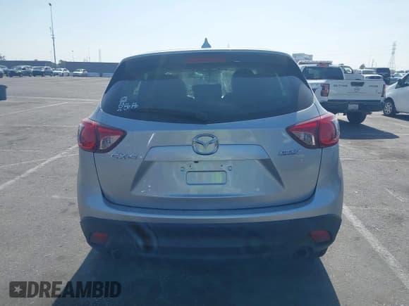 ✅ 2016 Mazda CX-5 Sport • VIN: JM3KE2BY4G0845816 • Lot: 42333248. Listed on IAAI with 48,504 mi. Free auction sales archive from the USA and detailed vehicle history report at DreamBid. Image 16.