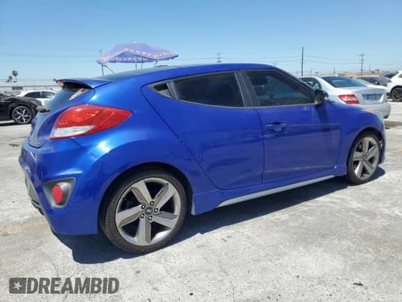 2013 Hyundai Veloster Turbo с VIN KMHTC6AE8DU136131, выставлен на аукционе Copart как лот 63934125 с пробегом 163 140 миль миль и Чистый • Clean title. История ставок и продаж доступна на DreamBid. Изображение 3.