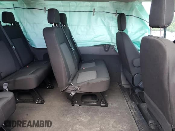 ✅ 2023 Ford Transit Passenger XL • VIN: 1FBAX2X86PKB35851 • Lot: 71126324. Wystawiony na Copart z przebiegiem 8 402 mil. Bezpłatny archiwum sprzedaży aukcyjnych z USA i szczegółowy raport historii pojazdu na DreamBid. Zdjęcie 11.