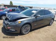 ✅ 2018 Ford Fusion Titanium • VIN: 3FA6P0SU9JR150413 • Лот: 42830416. Опубликован ранее на IAAI с пробегом 60 895 миль. Бесплатный доступ к архиву аукционных продаж из США и подробный отчёт об истории автомобиля на DreamBid. Изображение 2.