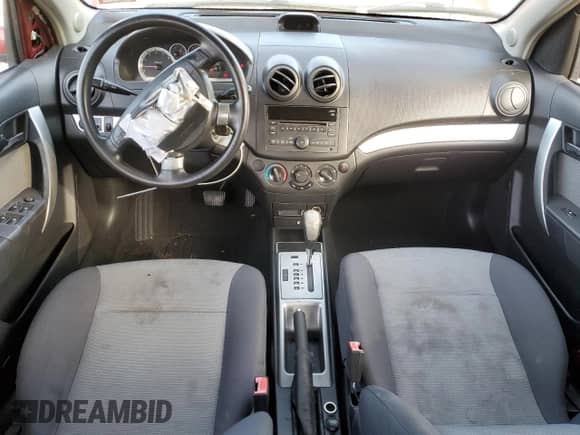 2011 Chevrolet Aveo 1LT с VIN KL1TD6DE0BB205956, выставлен на аукционе Copart как лот 81229124 с пробегом 143 558 миль миль и Списание • Salvage title. История ставок и продаж доступна на DreamBid. Изображение 8.