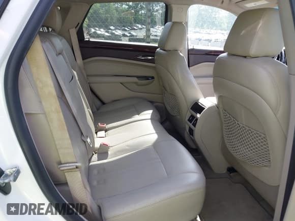 ✅ 2012 Cadillac SRX Performance Collection • VIN: 3GYFNBE30CS599466 • Lot: 42053911. Listed on IAAI with 167,242 mi. Free auction sales archive from the USA and detailed vehicle history report at DreamBid. Image 8.