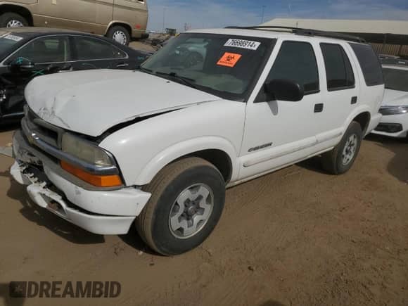 2004 Chevrolet Blazer LS z VIN 1GNDT13X74K161079, wystawiony jako Copart lot #76698914 z przebiegiem 123 726 mil mil oraz Szkoda całkowita • Salvage title. Historia ofert i sprzedaży dostępna na DreamBid. Obrazek 1.