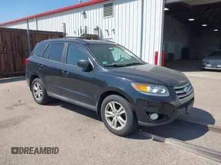 ✅ 2012 Hyundai Santa Fe SE • VIN: 5XYZHDAG8CG167966 • Lot: 42901636. Listed on IAAI with 113,334 mi. Free auction sales archive from the USA and detailed vehicle history report at DreamBid. Image 1.