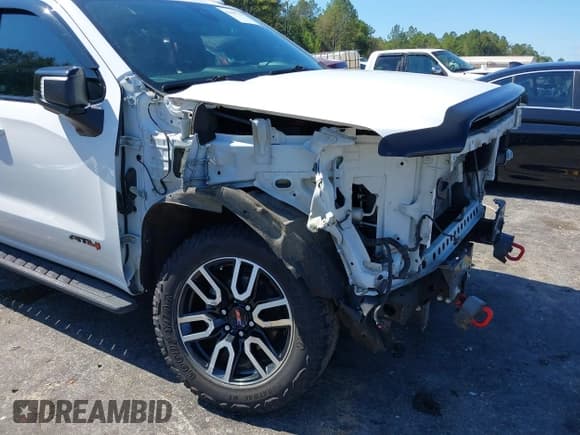 ✅ 2021 GMC Sierra 1500 AT4 • VIN: 3GTP9EEL6MG189033 • Лот: 43409211. Опубликован ранее на IAAI с пробегом 111 249 миль. Бесплатный доступ к архиву аукционных продаж из США и подробный отчёт об истории автомобиля на DreamBid. Изображение 20.